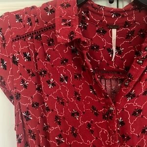 Flowy red romper, with pockets, cute metal buttons, great piece!